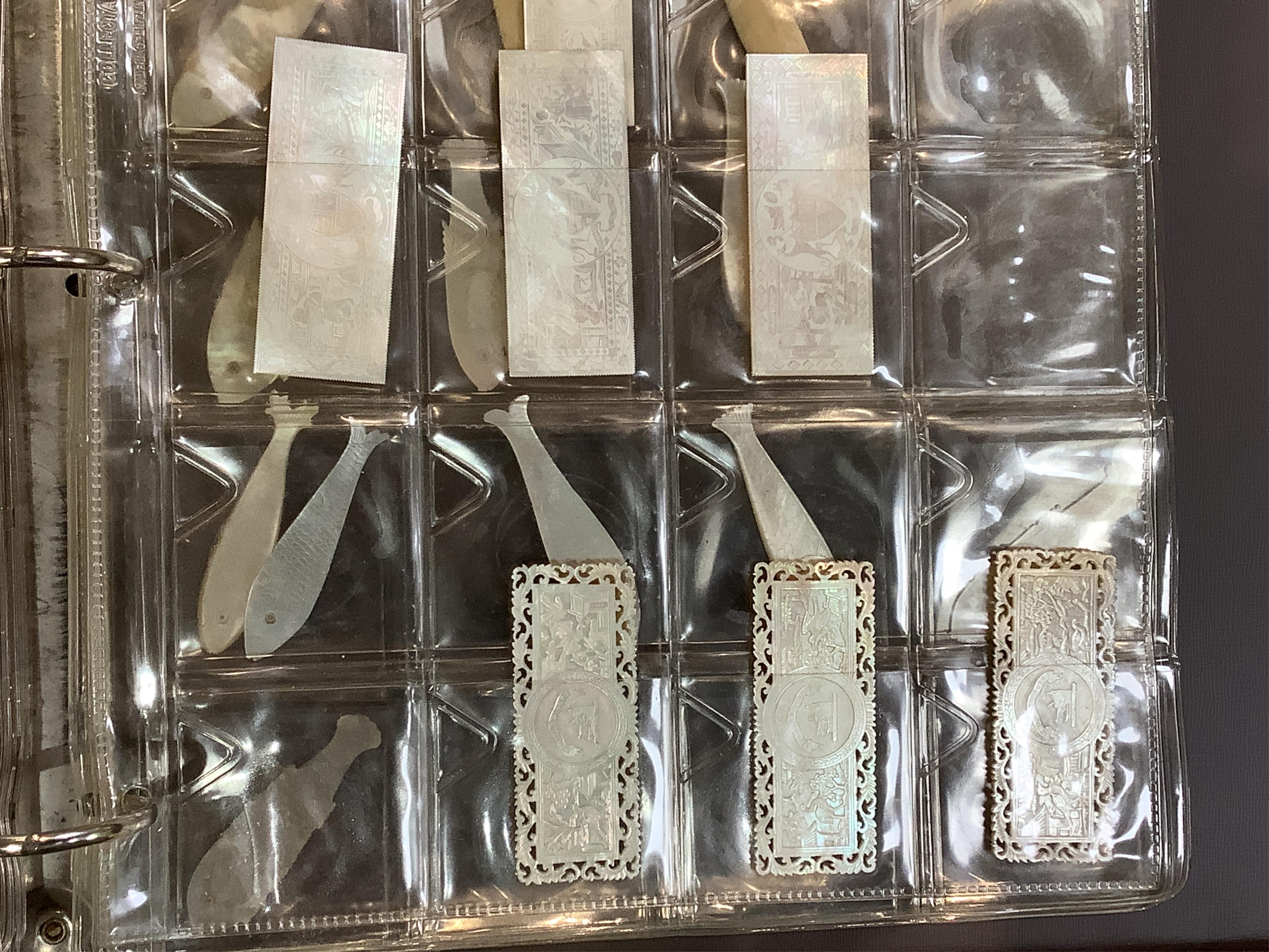 An extensive collection of Chinese mother of pearl gaming counters, in an album. Condition - the majority of the counters in good condition, occasional examples with tiny splinter edge chips